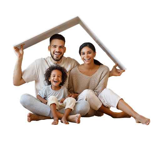 Family sitting under a roof shaped board